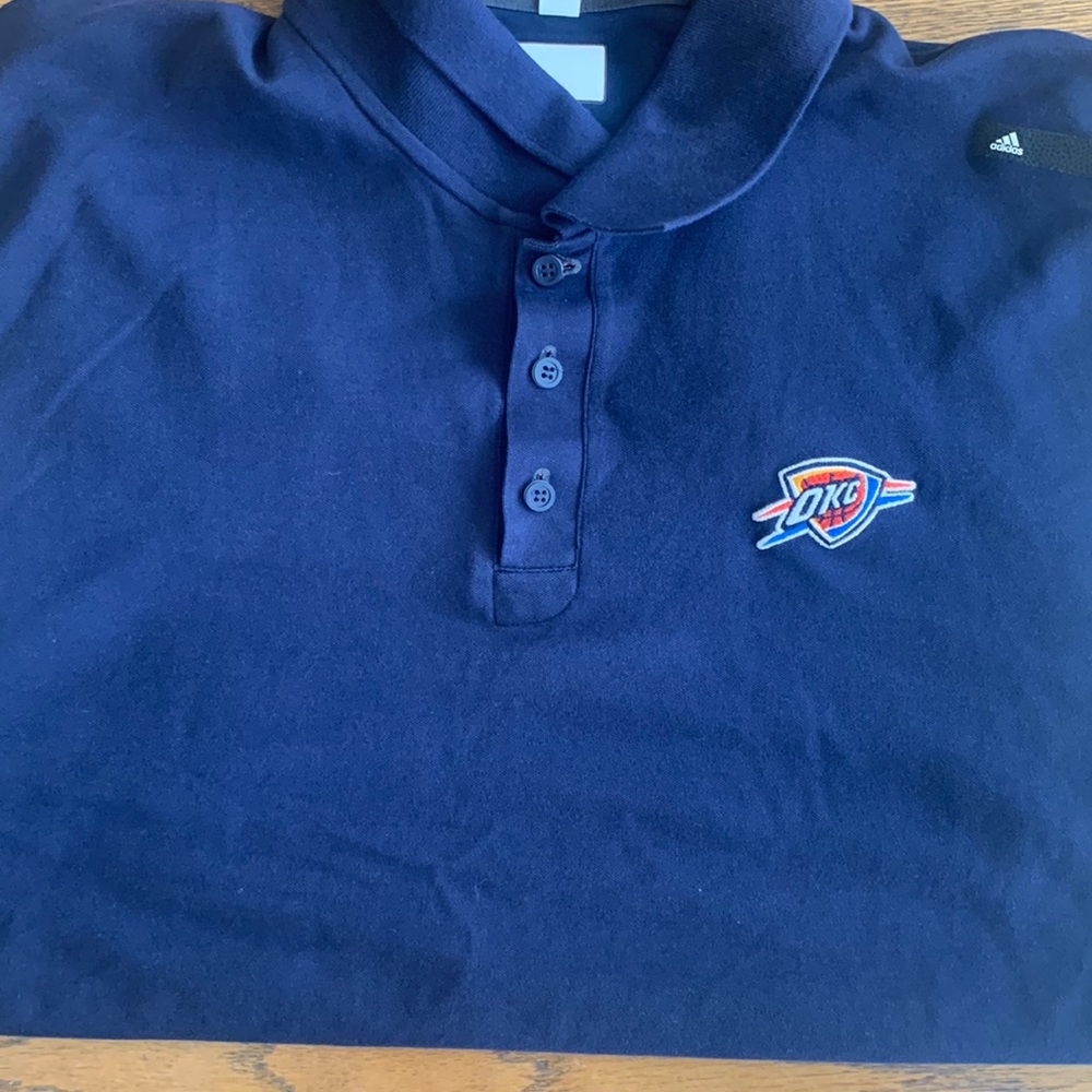 Thunder Addis’s collared shirt.
